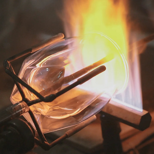 The Norlan Whisky Glass being joined by a linear flame in the production process