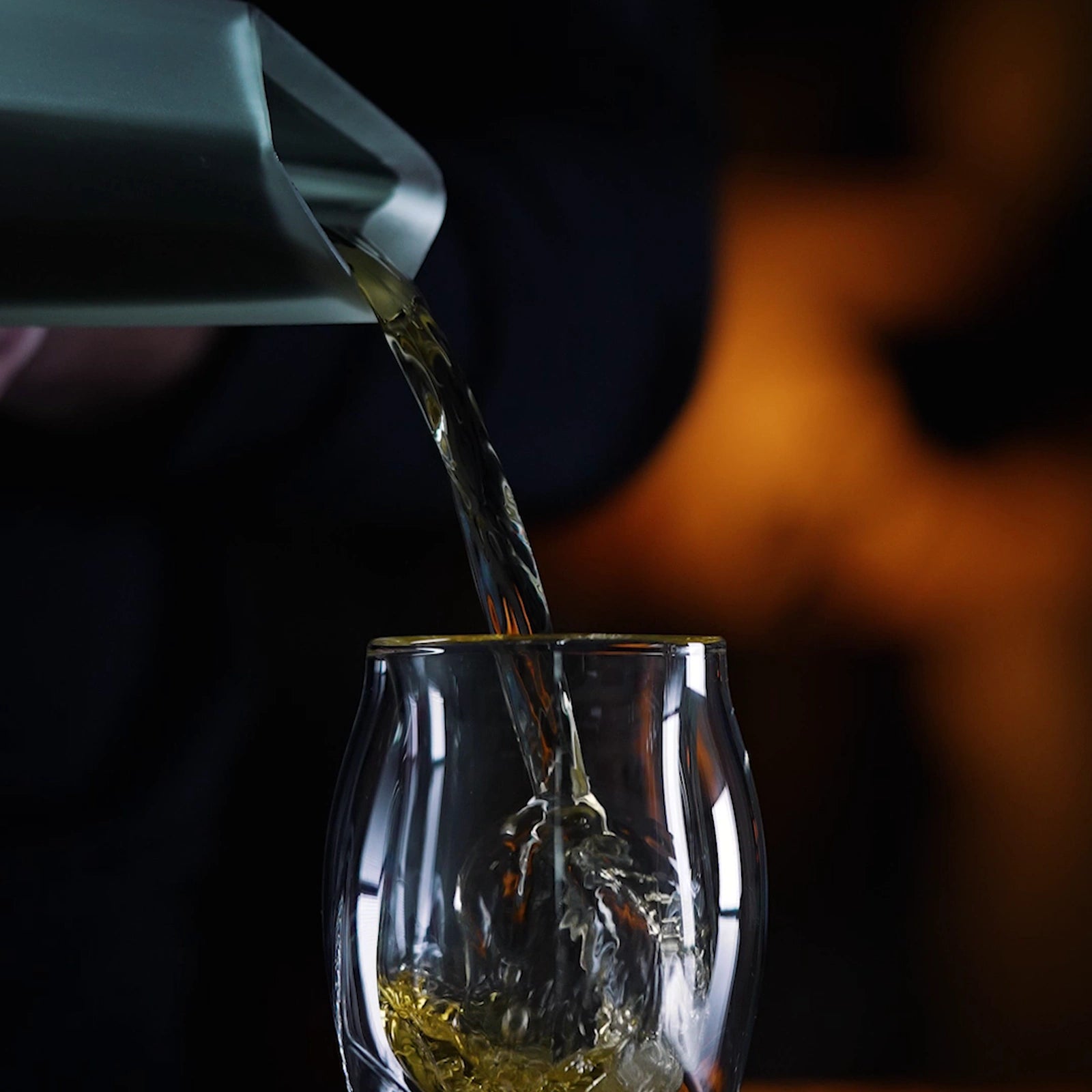Whisky being poured from Raif Whisky Decanter into the Norlan Whisky Glass by Norlan